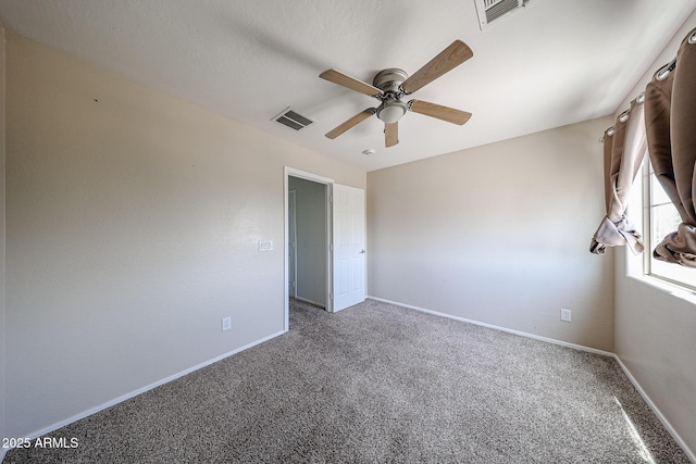15365 W Valentine St, Surprise, AZ 85379 - spare room with ceiling fan, carpet, and baseboards