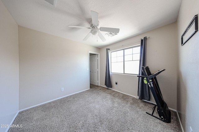 15365 W Valentine St, Surprise, AZ 85379 - workout room with carpet flooring, a ceiling fan, and baseboards