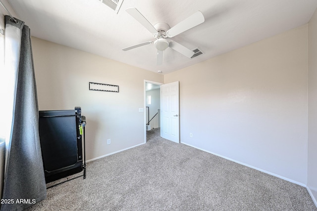 15365 W Valentine St, Surprise, AZ 85379 - unfurnished bedroom with carpet, baseboards, and ceiling fan