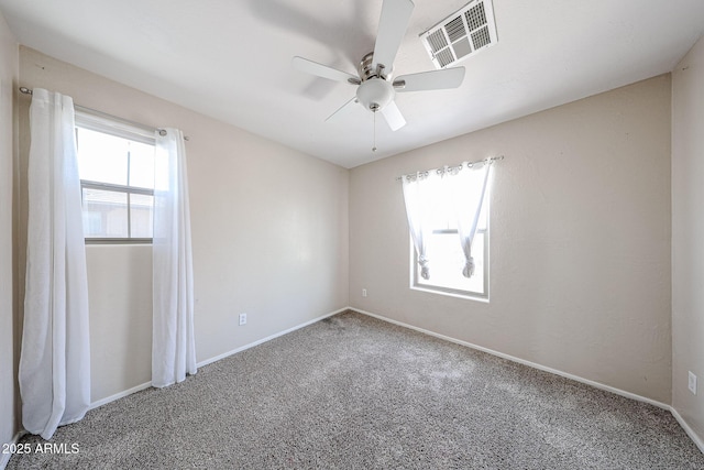 15365 W Valentine St, Surprise, AZ 85379 - carpeted spare room featuring ceiling fan and baseboards