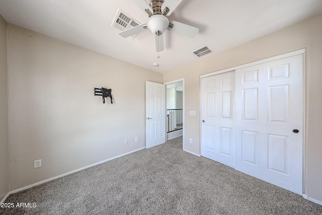 15365 W Valentine St, Surprise, AZ 85379 - unfurnished bedroom with carpet flooring, baseboards, a closet, and ceiling fan