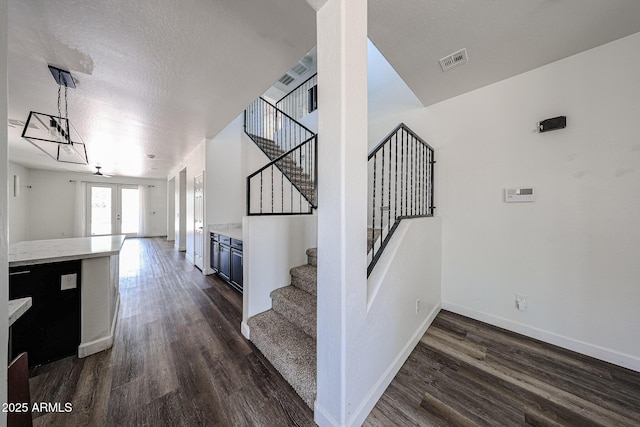 15365 W Valentine St, Surprise, AZ 85379 - stairway with wood finished floors and baseboards