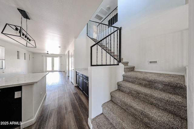 15365 W Valentine St, Surprise, AZ 85379 - stairs with wood finished floors and baseboards