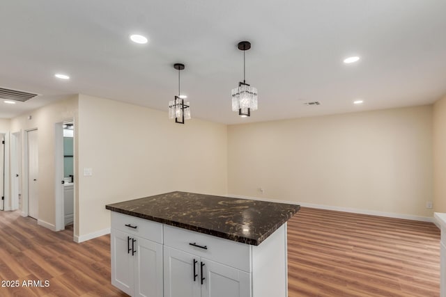 kitchen featuring white cabinetry, recessed lighting, visible vents, and light wood finished floors