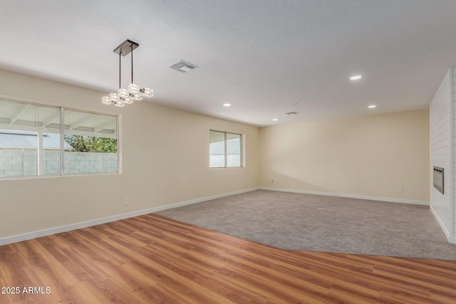 empty room featuring recessed lighting, visible vents, baseboards, and light wood-style floors