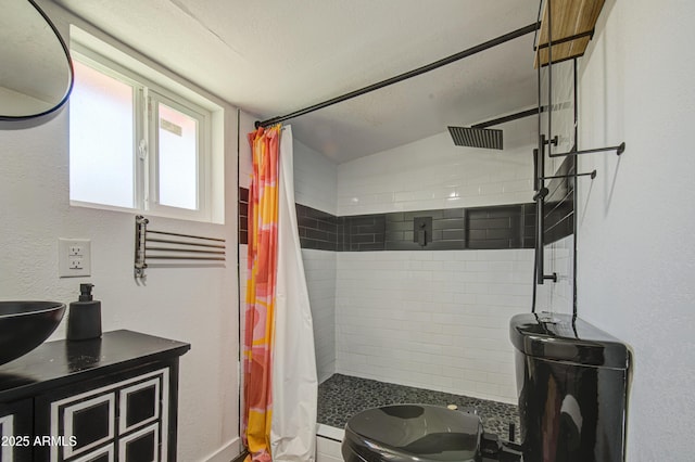 520 S Macdonald, Mesa, AZ 85210 - full bathroom featuring a stall shower, vanity, baseboards, toilet, and vaulted ceiling