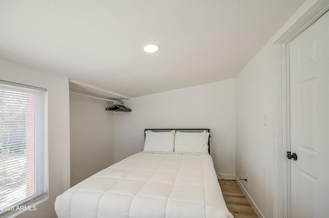 520 S Macdonald, Mesa, AZ 85210 - bedroom with multiple windows, wood finished floors, recessed lighting, and baseboards