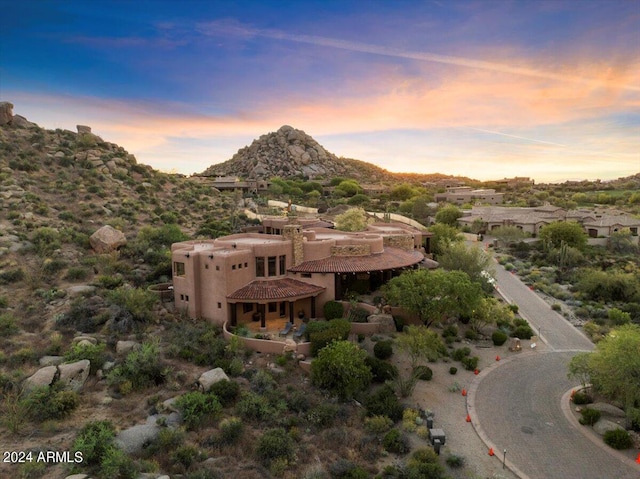 exterior space featuring a mountain view