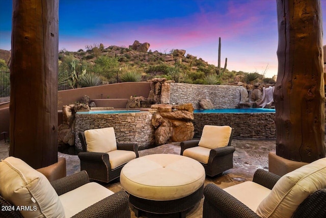 patio terrace at dusk with outdoor lounge area