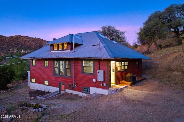 816 Tombstone Cyn Unit C, Bisbee, AZ 85603 - rear view of property with a metal roof