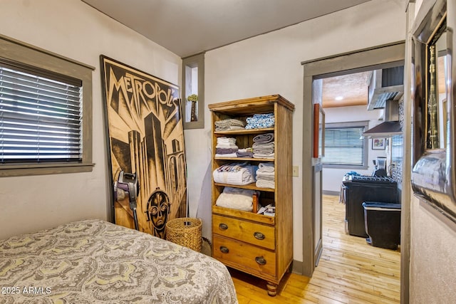 816 Tombstone Cyn Unit C, Bisbee, AZ 85603 - bedroom with light wood-style flooring