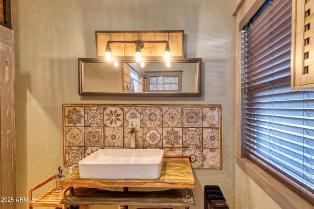 816 Tombstone Cyn Unit C, Bisbee, AZ 85603 - bathroom with a textured wall, radiator, and vanity