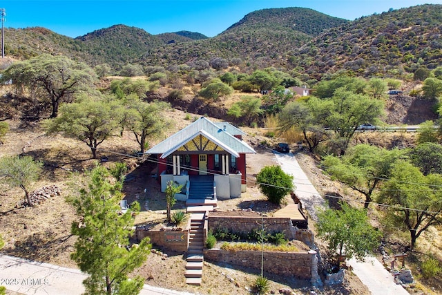 816 Tombstone Cyn Unit C, Bisbee, AZ 85603 - view of front of home featuring stairs, a mountain view, and covered porch