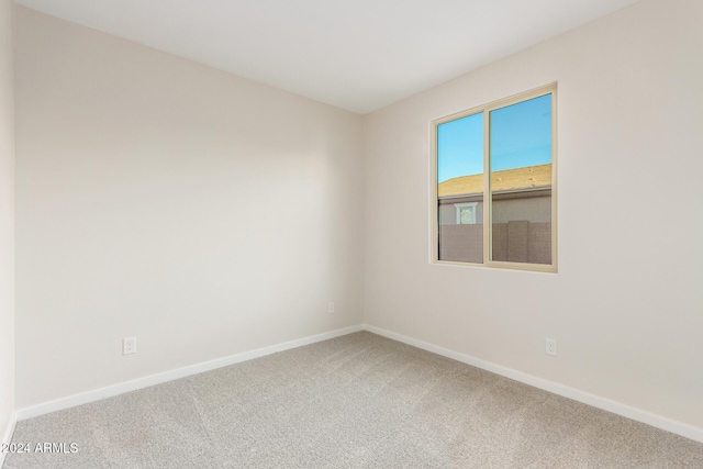 spare room with carpet flooring