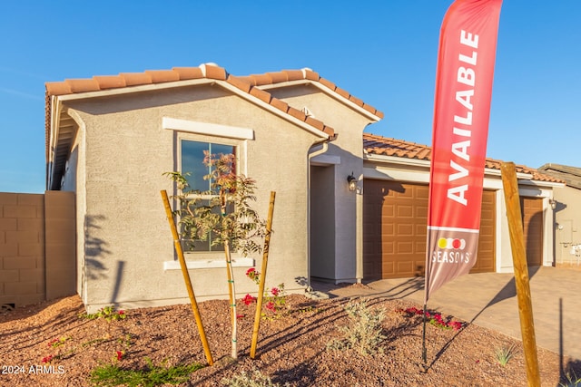 exterior space with a garage