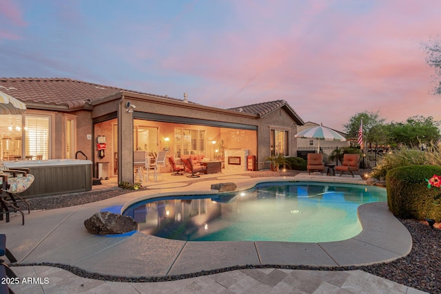 20558 N 263rd Dr, Buckeye, AZ 85396 - view of pool with a hot tub, a patio, a fenced in pool, and fence