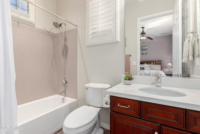 full bath featuring a ceiling fan, vanity, toilet,  shower combination, and connected bathroom