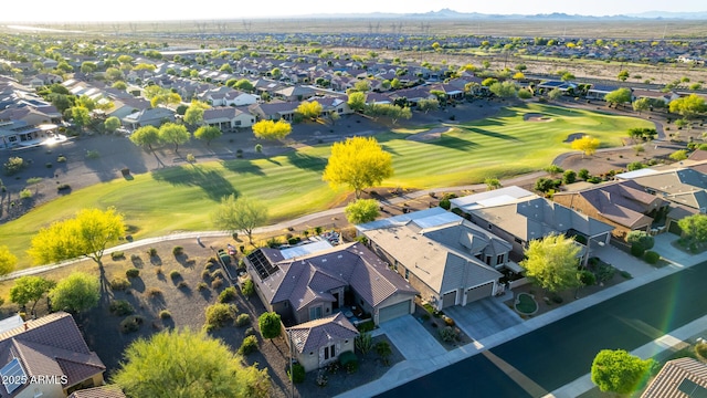 bird's eye view featuring view of golf course, a mountain view, and a residential view