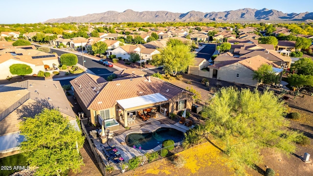 bird's eye view featuring a residential view and a mountain view