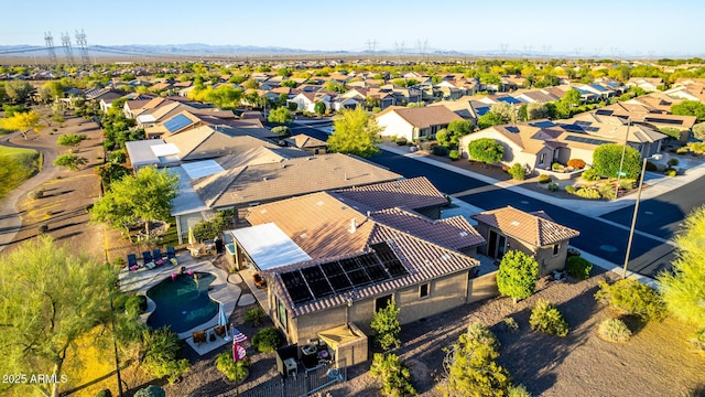 bird's eye view featuring a residential view and a mountain view