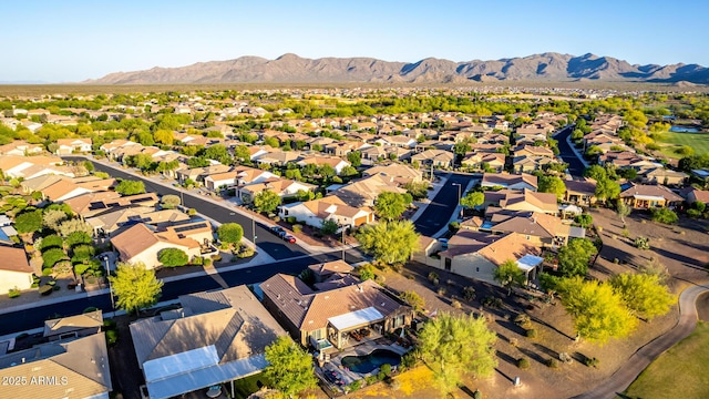 aerial view featuring a mountain view and a residential view