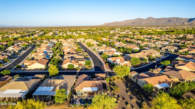 birds eye view of property featuring a mountain view and a residential view