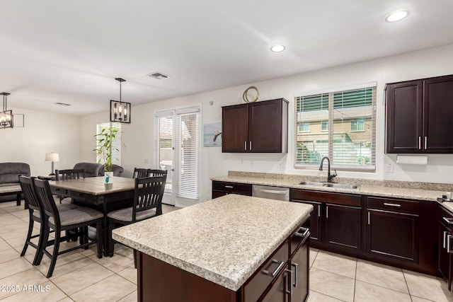 6746 W Wethersfield Rd, Peoria, AZ 85381 - kitchen featuring a sink, visible vents, light countertops, and dishwasher