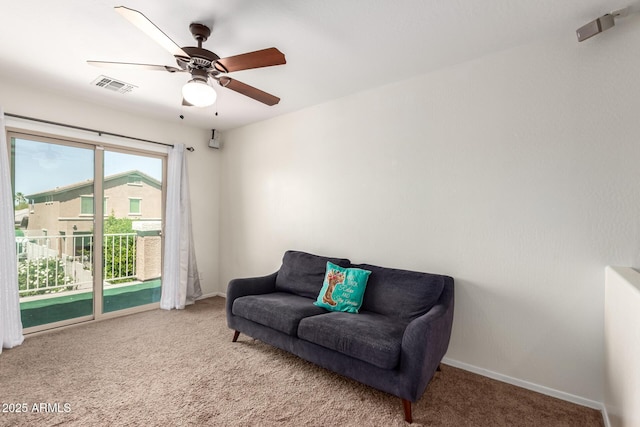 6746 W Wethersfield Rd, Peoria, AZ 85381 - sitting room with ceiling fan, baseboards, carpet, and visible vents