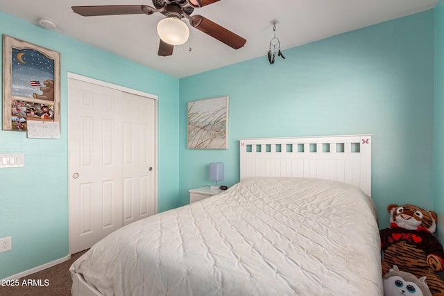 6746 W Wethersfield Rd, Peoria, AZ 85381 - carpeted bedroom featuring a closet, baseboards, and a ceiling fan