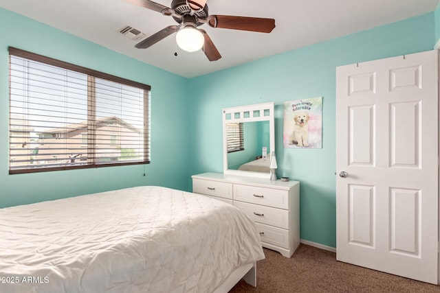 6746 W Wethersfield Rd, Peoria, AZ 85381 - bedroom featuring light carpet, visible vents, baseboards, and a ceiling fan