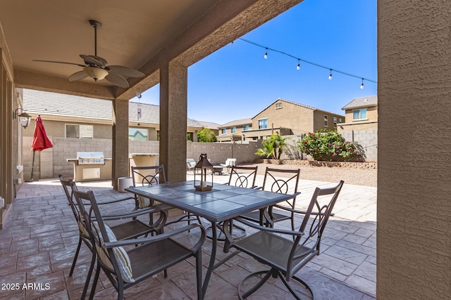 6746 W Wethersfield Rd, Peoria, AZ 85381 - view of patio / terrace with grilling area, outdoor dining area, a fenced backyard, and a ceiling fan