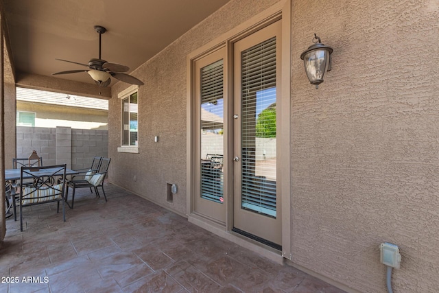 6746 W Wethersfield Rd, Peoria, AZ 85381 - view of patio / terrace with outdoor dining space, fence, and ceiling fan