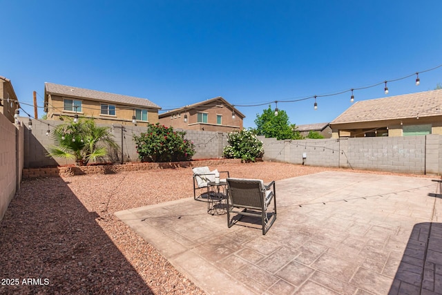 6746 W Wethersfield Rd, Peoria, AZ 85381 - view of patio featuring a fenced backyard
