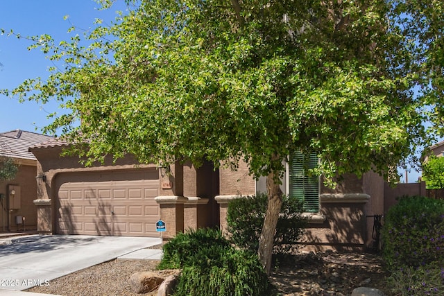 6746 W Wethersfield Rd, Peoria, AZ 85381 - view of front facade with driveway, a garage, and stucco siding