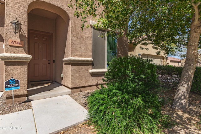 6746 W Wethersfield Rd, Peoria, AZ 85381 - entrance to property with stucco siding