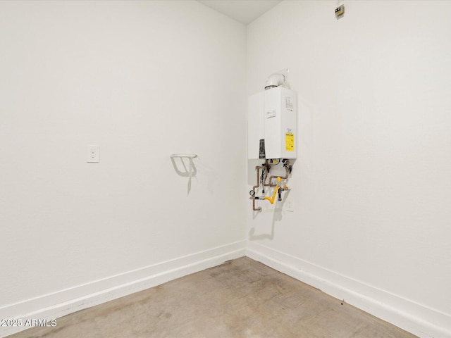 laundry room with water heater