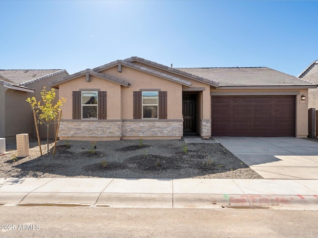 view of front of home with a garage