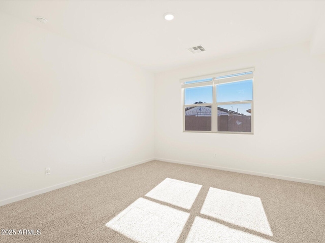 view of carpeted spare room