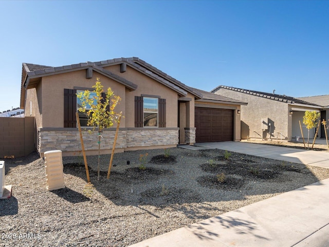 view of front of property with a garage