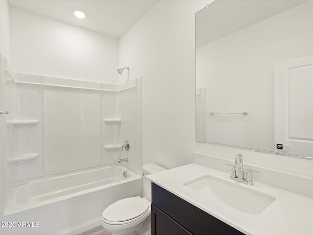 full bathroom featuring shower / bathtub combination, vanity, and toilet