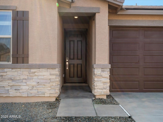 entrance to property with a garage