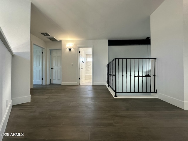 entrance foyer with dark hardwood / wood-style floors