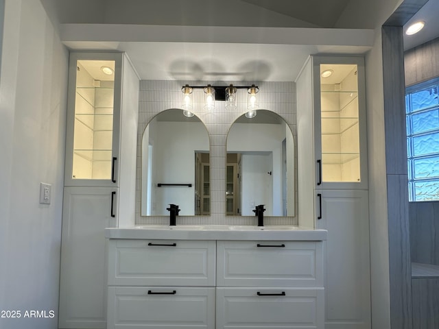 bathroom featuring vanity and plenty of natural light