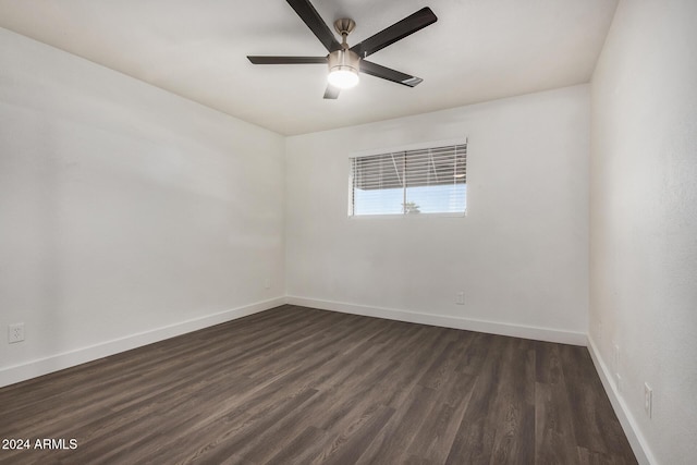 18202 Cave Creek Rd Unit 141, Phoenix, AZ 85032 - unfurnished room featuring baseboards, dark wood-type flooring, and a ceiling fan