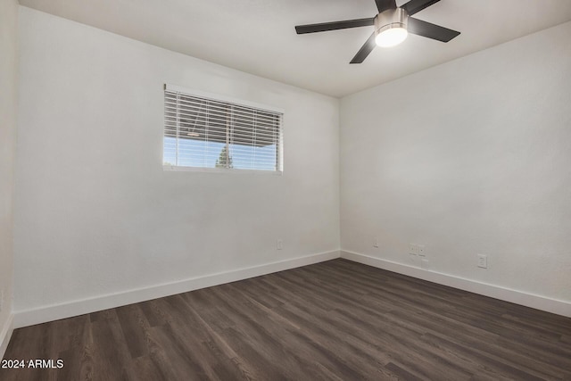18202 Cave Creek Rd Unit 141, Phoenix, AZ 85032 - unfurnished room featuring baseboards, dark wood finished floors, and a ceiling fan