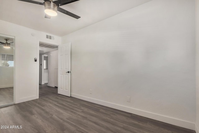 18202 Cave Creek Rd Unit 141, Phoenix, AZ 85032 - unfurnished bedroom featuring baseboards, dark wood-type flooring, and ceiling fan