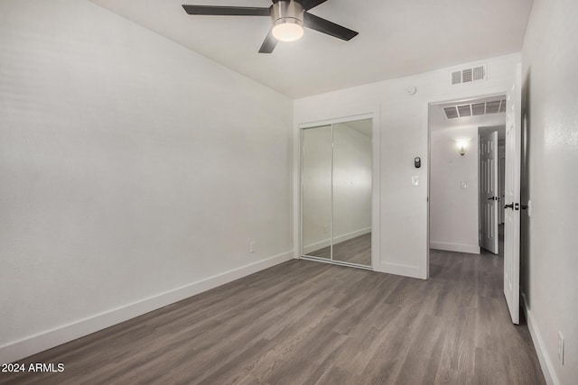 18202 Cave Creek Rd Unit 141, Phoenix, AZ 85032 - unfurnished bedroom with wood finished floors, baseboards, a closet, and ceiling fan
