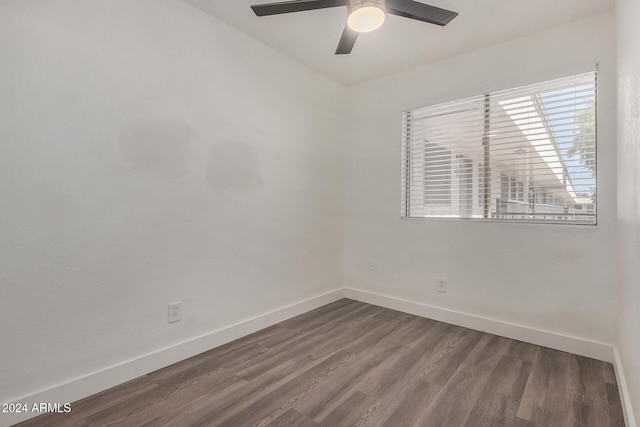 18202 Cave Creek Rd Unit 141, Phoenix, AZ 85032 - empty room with a ceiling fan, baseboards, and dark wood-style flooring