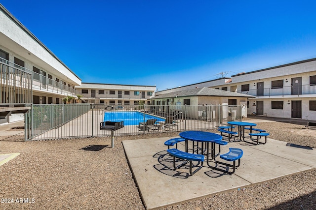 18202 Cave Creek Rd Unit 141, Phoenix, AZ 85032 - community pool featuring a patio area