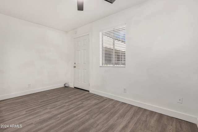 18202 Cave Creek Rd Unit 141, Phoenix, AZ 85032 - spare room featuring baseboards, a ceiling fan, and wood finished floors